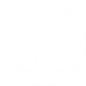 INKO Cocinas: Logótipo circular em cinzento com as iniciais LK dentro de um círculo, design corporativo moderno e elegante.